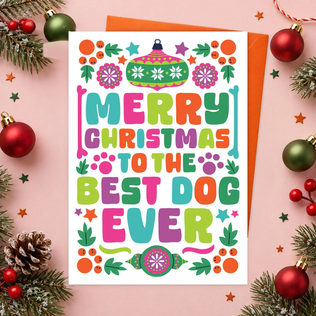 Best Dog Ever Christmas 2025 – Edible Dog Christmas Card, chicken flavour by Scoff Paper, shown with an orange envelope