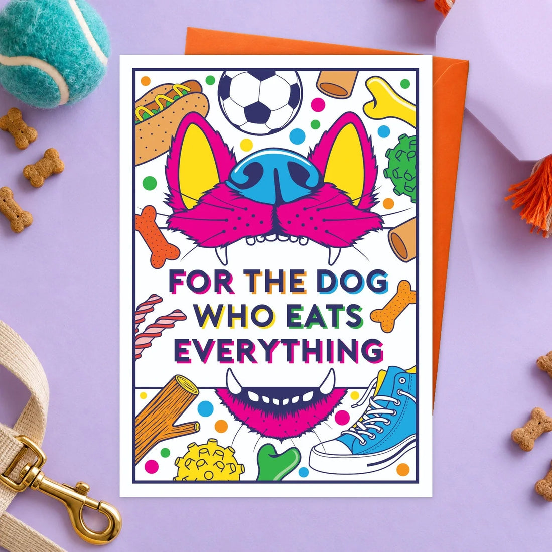 Dog Who Eats Everything – Edible Dog Card, chicken flavour by Scoff Paper, shown with an orange envelope