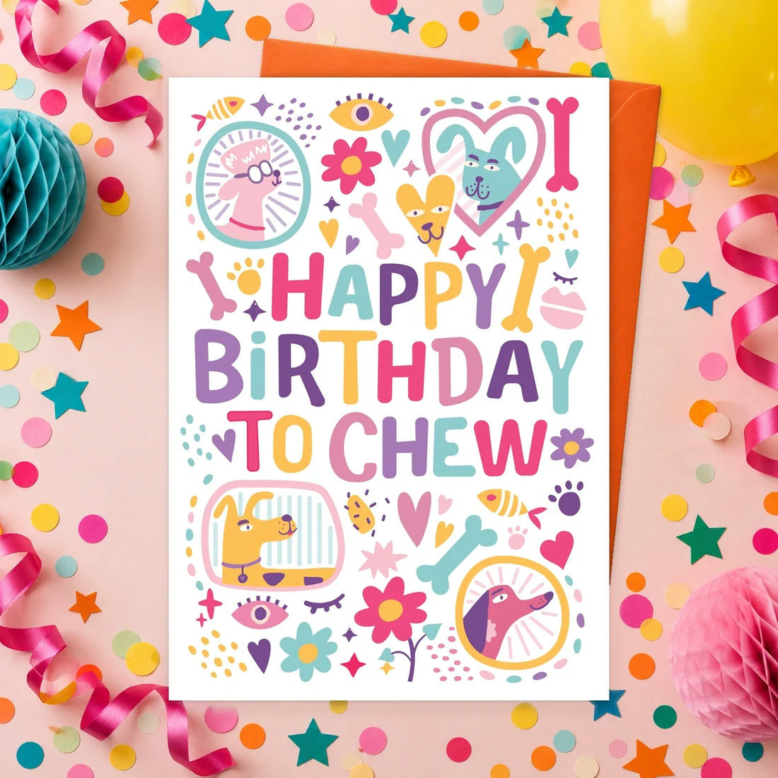 Happy Birthday to Chew - Hearts – Edible Dog Birthday Card, chicken flavour by Scoff Paper, shown with an orange envelope