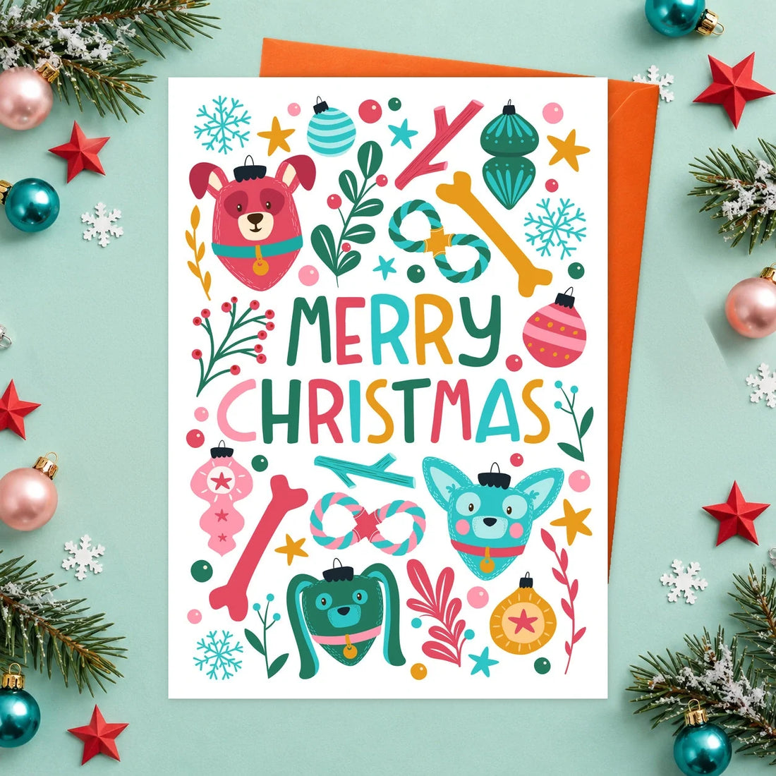 Merry Christmas Turkey – Edible Dog Christmas Card, turkey flavour by Scoff Paper, shown with an orange envelope