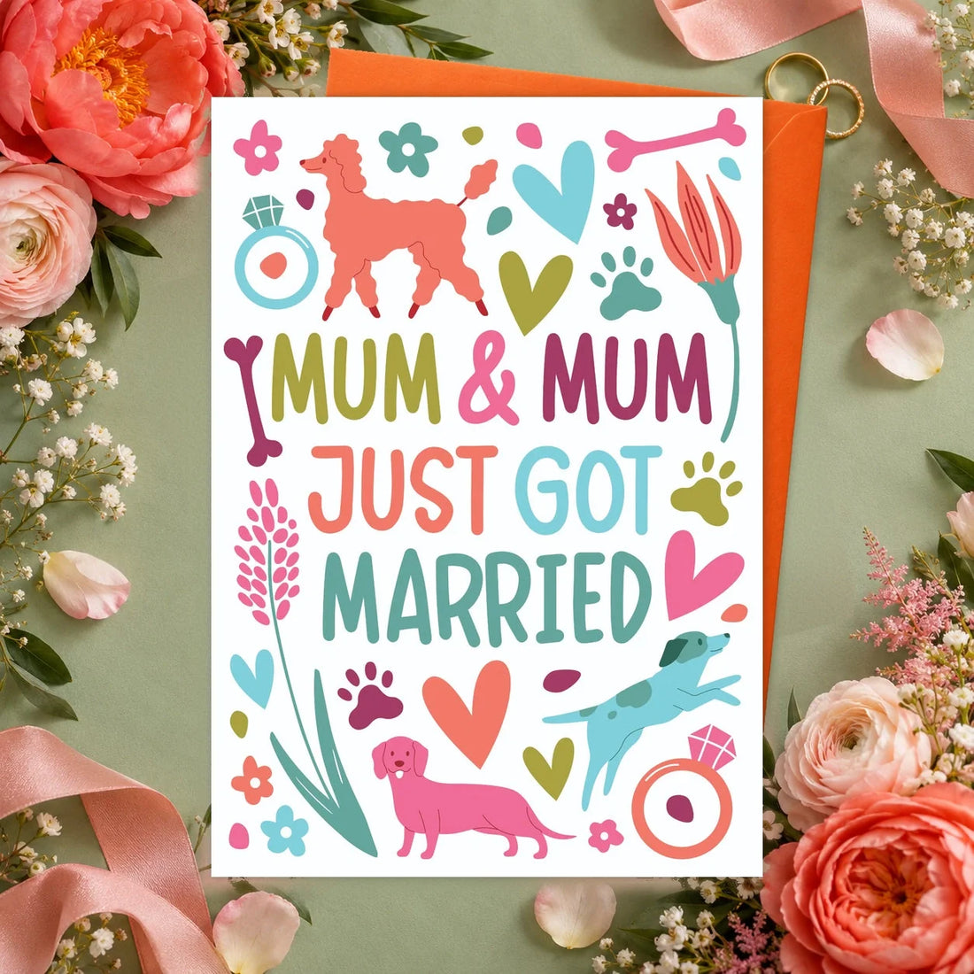 Mum & Mum Wedding – Edible Dog Wedding Card, chicken flavour by Scoff Paper, shown with an orange envelope