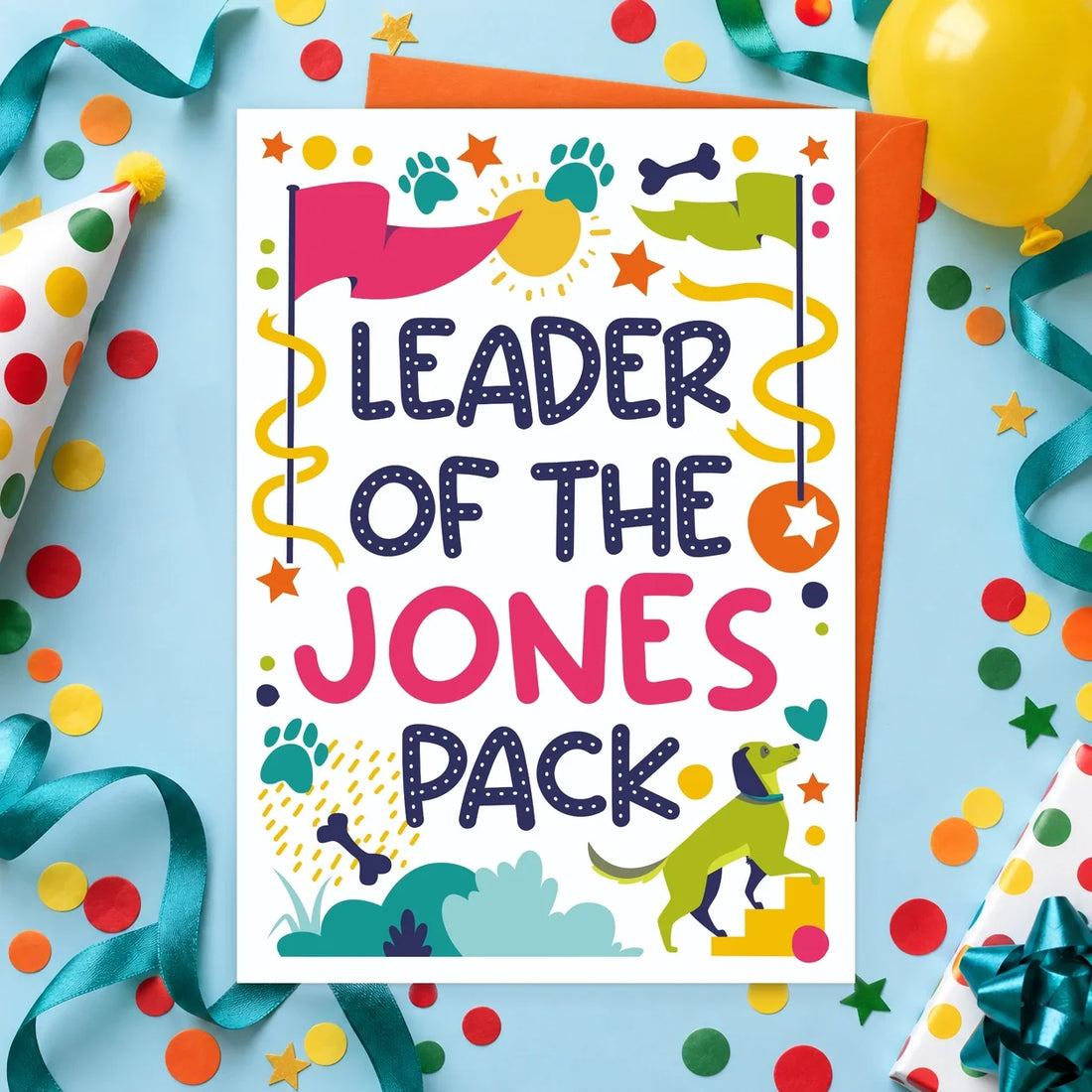 Leader of the Pack – Personalised Edible Dog Card, bacon flavour by Scoff Paper, shown with an orange envelope