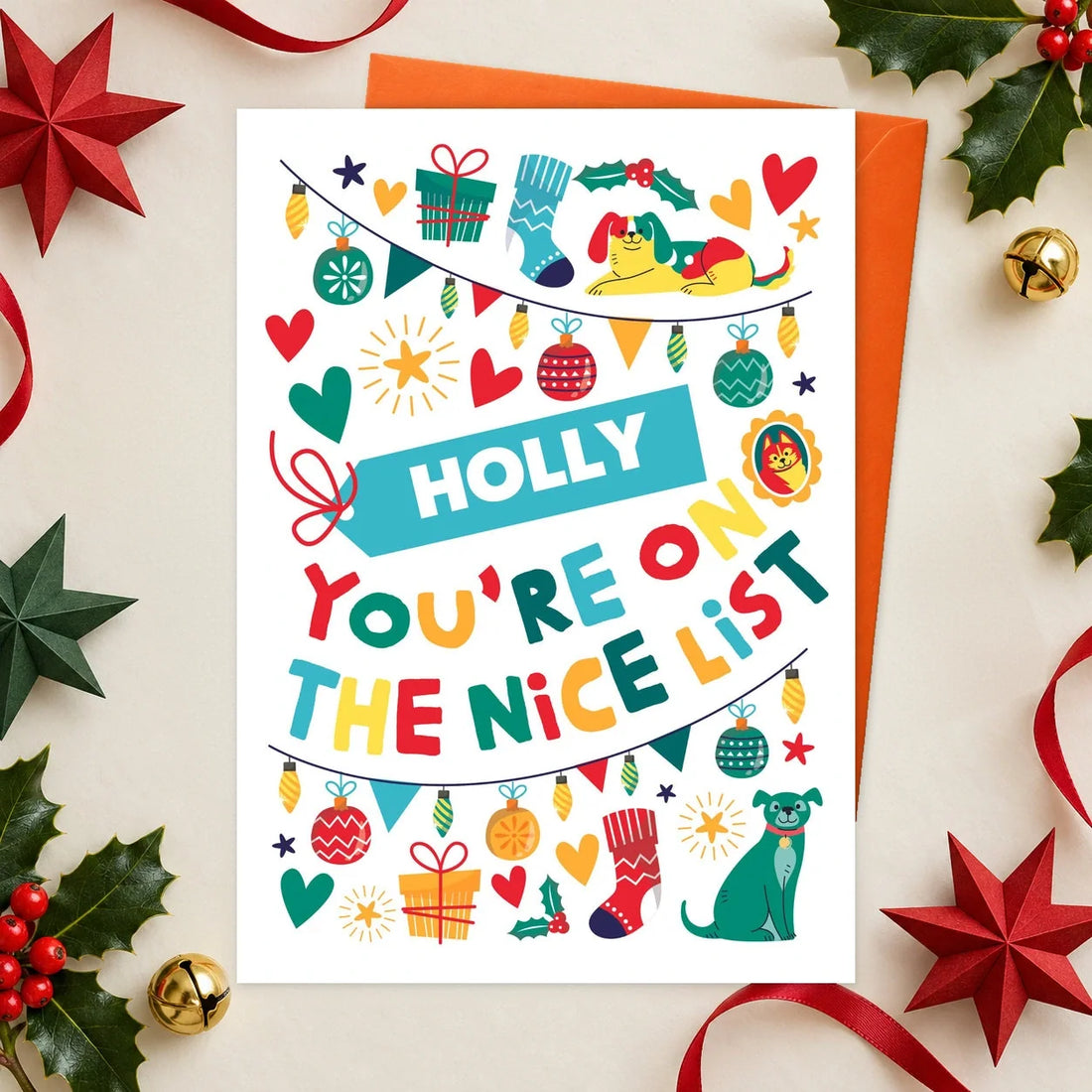 Nice List – Personalised Edible Dog Christmas Card, bacon flavour by Scoff Paper, shown with an orange envelope