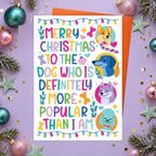 Popular – Edible Dog Christmas Card, bacon flavour by Scoff Paper, shown with an orange envelope
