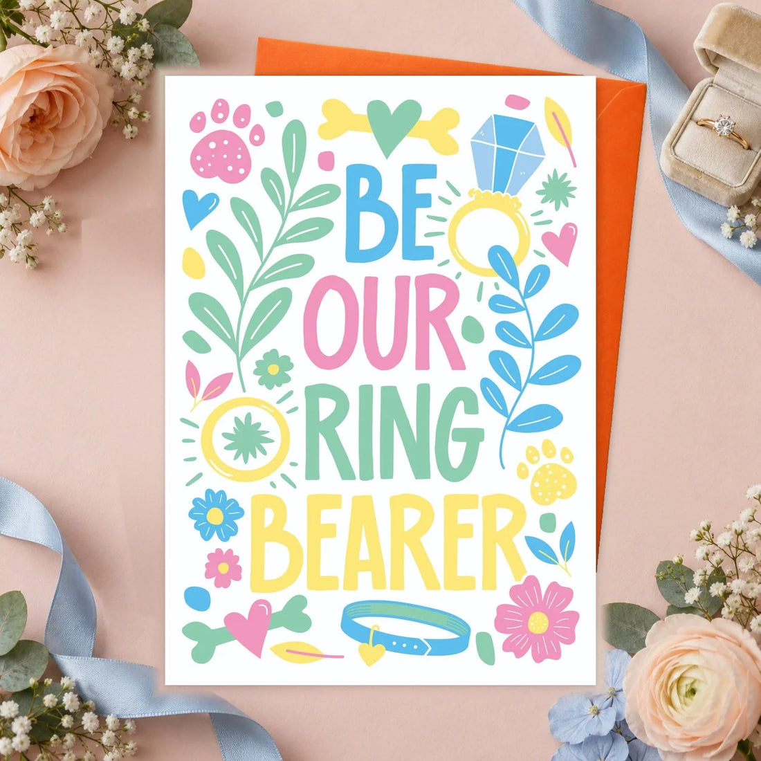 Ring Bearer – Edible Dog Wedding Card, chicken flavour by Scoff Paper, shown with an orange envelope